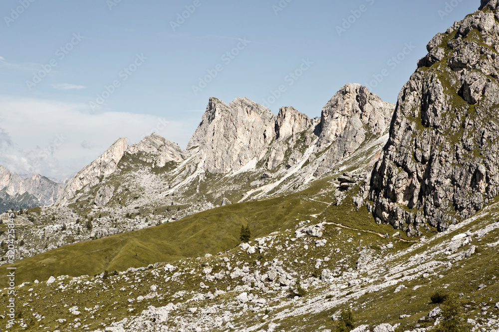 Hike the mountains of Passo Giau. The world famous Dolomites peaks in South Tyrol in the Alps of Italy. Belluno in Europe mountain scenery. Summer vibes