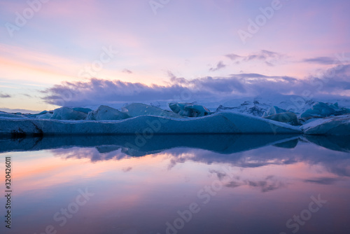 Amazing landscapes during the sunset with huge glaciers in the Jokulsarlon Glacier Lagoon (glacial river lagoon) in the east Iceland
