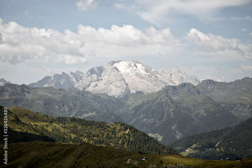 Hiking Dolomites mountains of Passo Giau. Peaks in South Tyrol in the Alps of Europe. Marmolata glacier view
