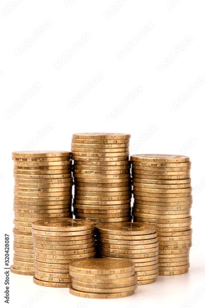 Stack of golden coins isolated on white background Stack of golden coins isolated on white background