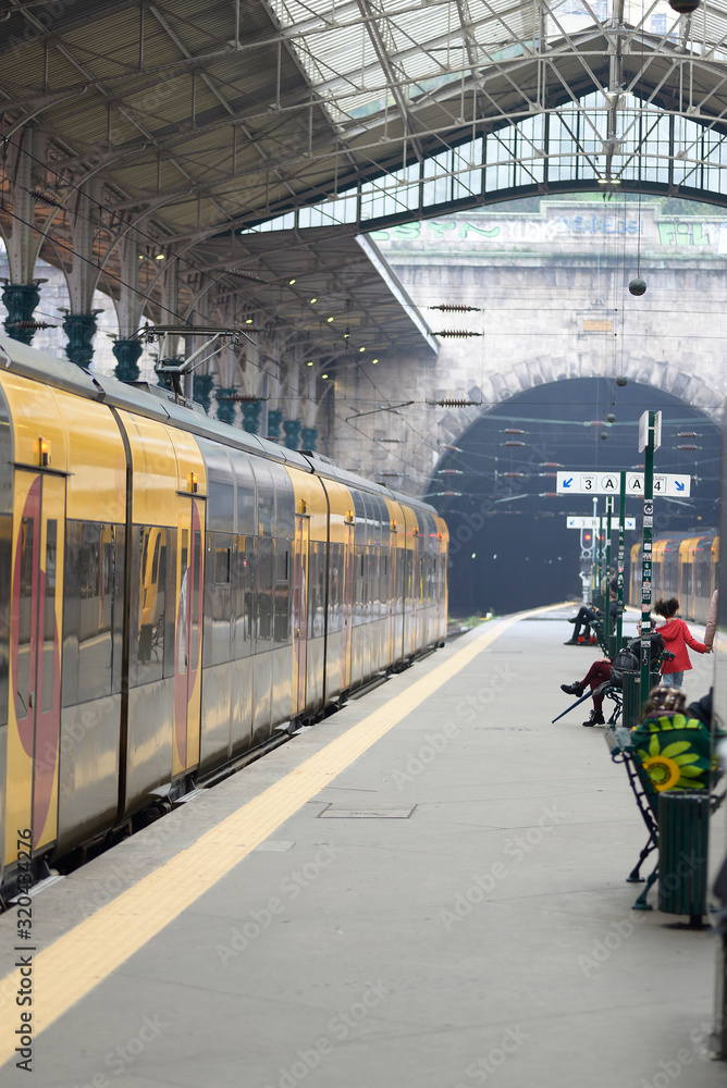 December 8, 2019, Porto, Portugal. passengers waiting for the train at the station December 8, 2019, Porto, Portugal. passengers waiting for the train at the station