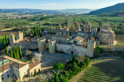 Aerial view of the Royal Abbey of Santa Maria de Poblet a Cistercian fortified monastery, founded in 1151 in Catalunya Spain photo