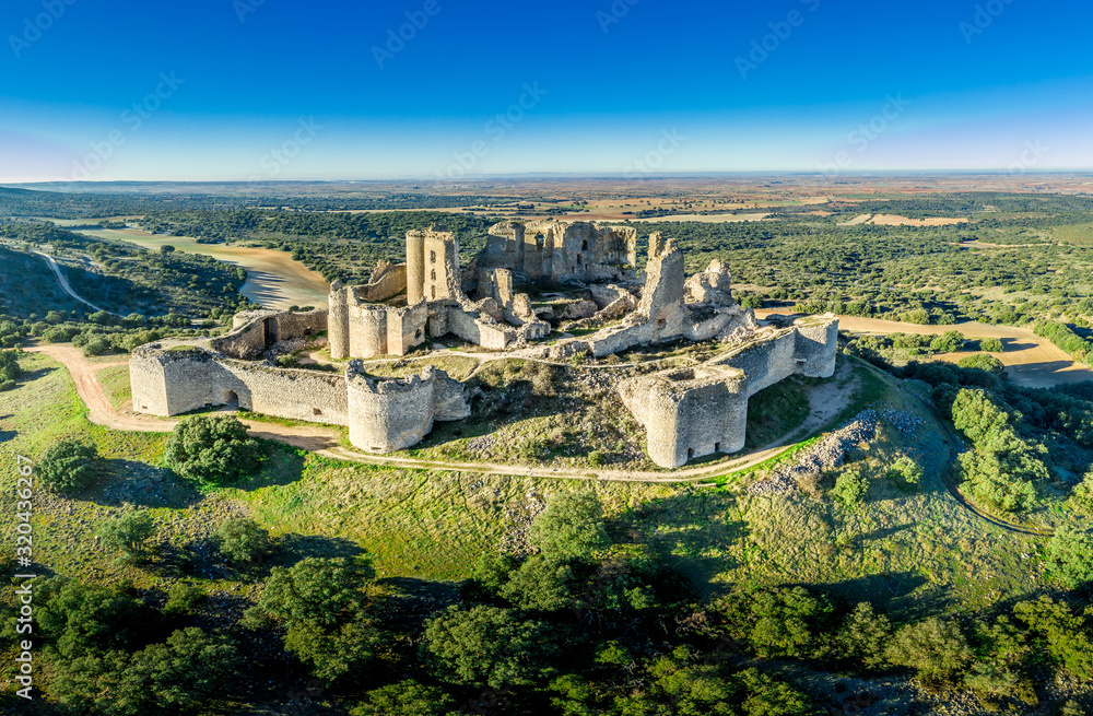 Aerial view of medieval castle ruin Pueble de Almenara in Cuenca Spain with convenctric walls, semicircular towers and angle bastions