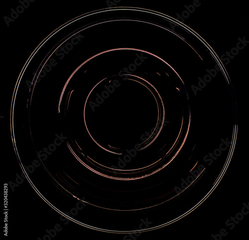 Abstract orange luminous circles in the dark