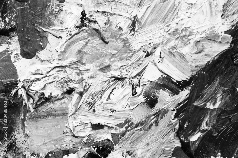 Fototapeta premium black and white contrasting background of oil paints