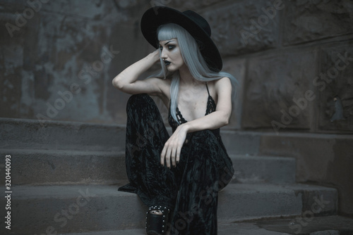 Dark gothic beautiful lady standing outdoor © Teodor Lazarev