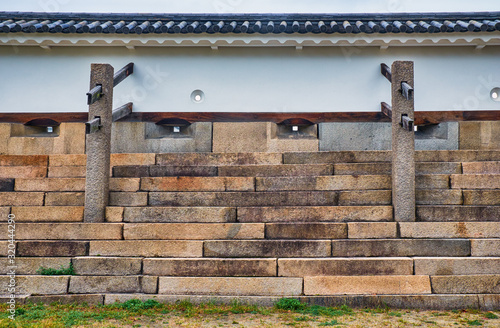 Obraz na płótnie The stone defensive wall with loopholes in Osaka Castle