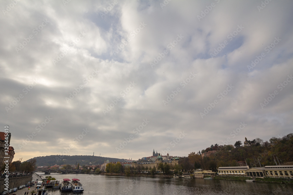 Panorama of the Old Town of Prague, Czech Republic,  on the Prague Castle (Prazsky hrad) seen from the Vltava river. The castle is the main touristic landmark of the city