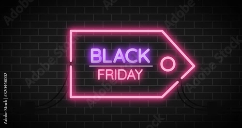Neon sign.black friday sign on brick background.