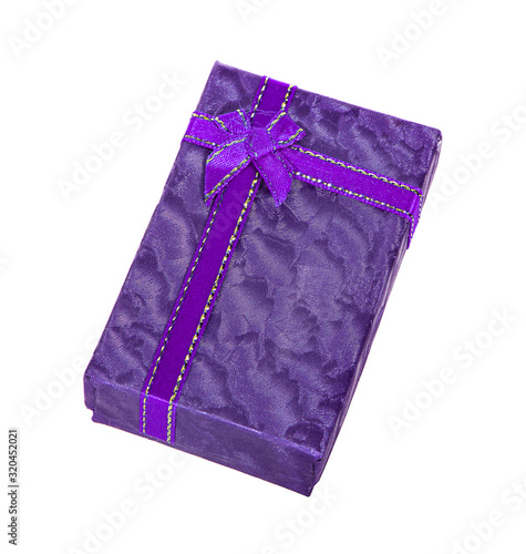 Purple gift box with a purple bow an isolated on white background