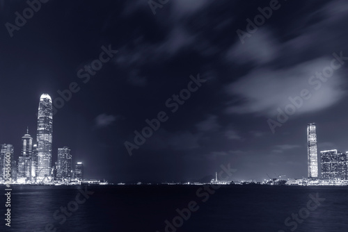 Photography Modern office building and skyline of Hong Kong City at night
