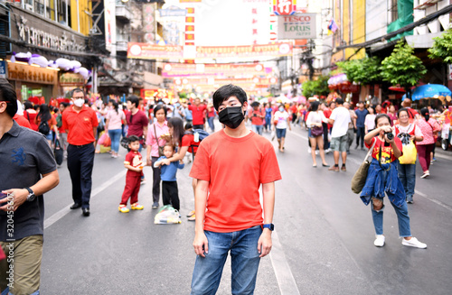 Photography The young man wearing a red dress went to visit a traditional Chinese New Year a