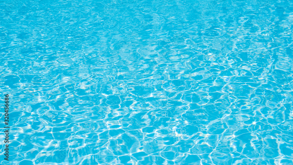 Blue water in swimming pool for background