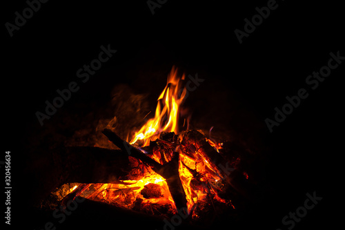 Camp fire in dark background, Fire from Burning wood.