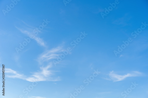Blue sky and white puffy clouds