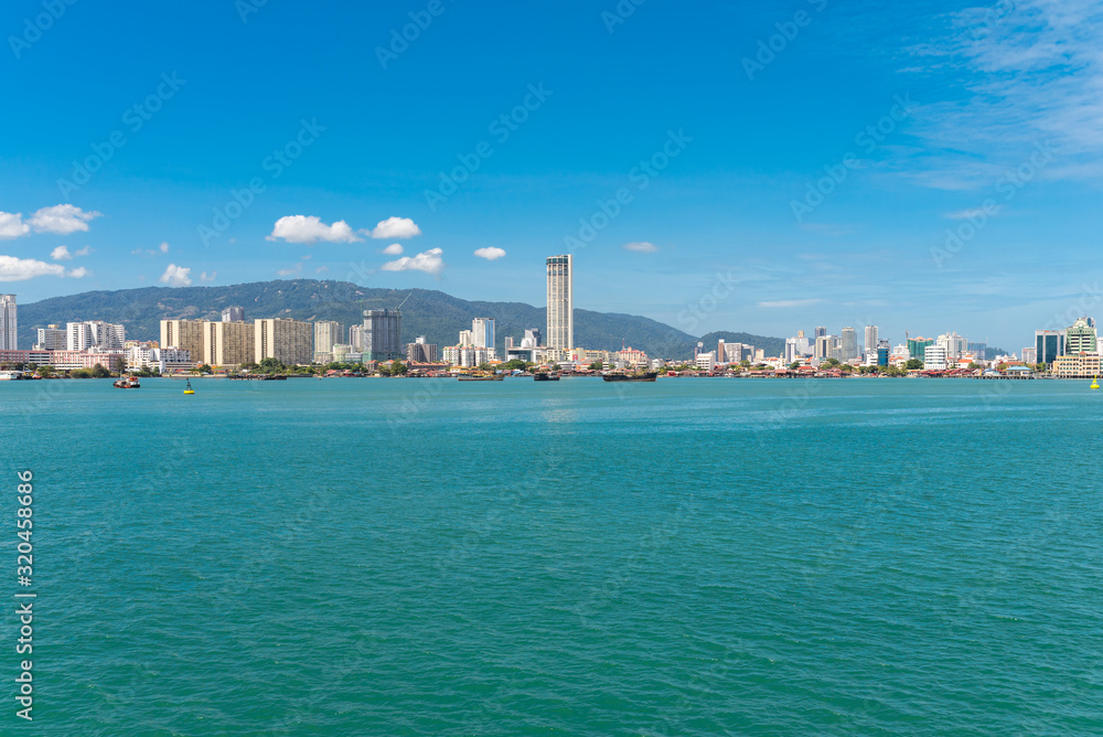 The Penang Strait with the City of Penang Island, George Town, the capital city of the Malaysian state of Penang The Penang Strait with the City of Penang Island, George Town, the capital city of the Malaysian state of Penang