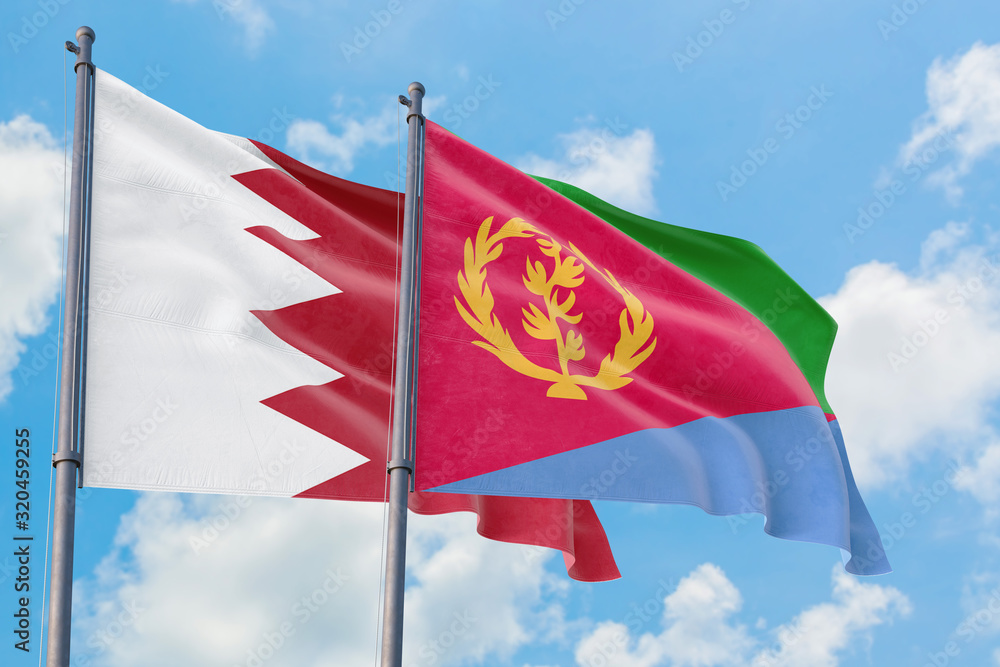 Eritrea and Bahrain flags waving in the wind against white cloudy blue sky together. Diplomacy concept, international relations.