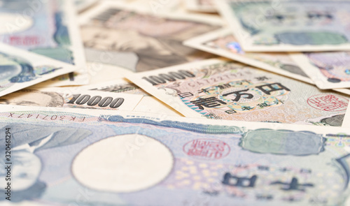 Close up japanese currency yen money banknote. Background concept for japan  economy. photo