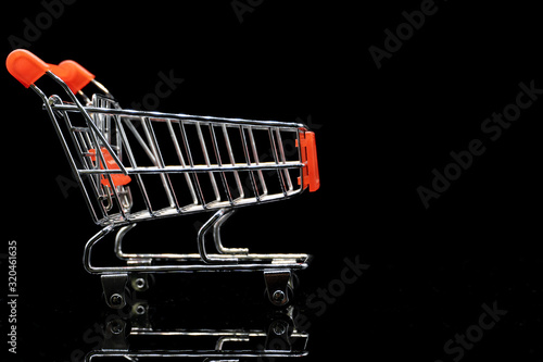 Small Shopping cart with text space black background