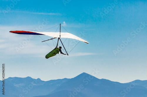 Photos Flying hang glider man in action