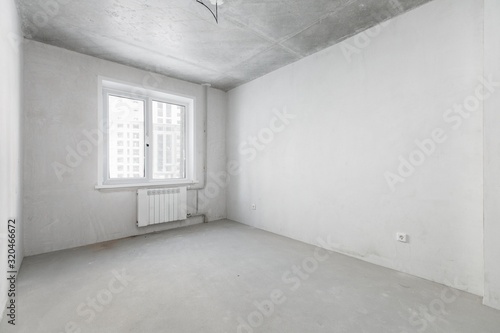 interior of the apartment without decoration in gray colors