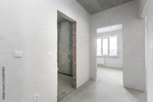 interior of the apartment without decoration in gray colors © gluschenkoart