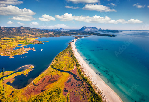 View from flying drone. Stunning spring view of La Cinta beach. Splendid morning scene of Sardinia island, Italy, Europe. Aerial Mediterranean seascape. Beauty of nature concept background.