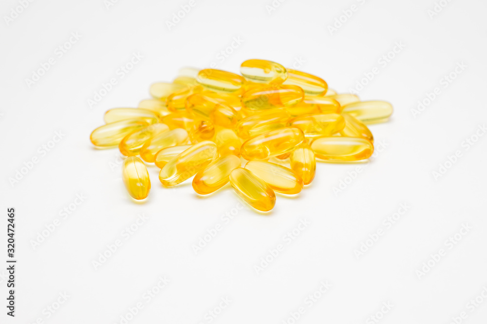 Cod liver oil omega 3 gel capsules on white background Cod liver oil omega 3 gel capsules on white background