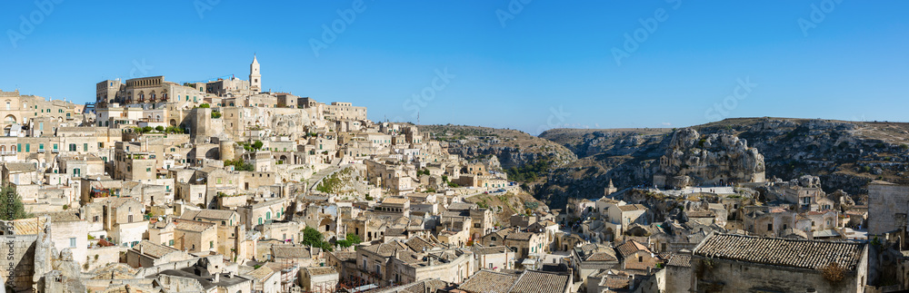 Panorama of Matera,  Basilicata, Southern Italy. View of the typical houses of the ancient stone town of Matera (Sassi di Matera),  Basilicata, Southern Italy.