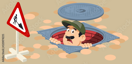 Plumber in sump. Worker in sewers. Open sewer manhole.