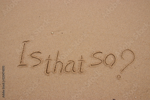 inscription on the sand, Handwriting words "Is that so?" on sand of beach.