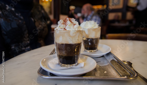Photography vienna coffee with whipped milk and orange licker