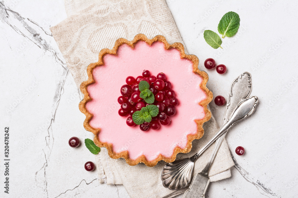 Delicious pink open tart with fresh cranberry and mint Delicious pink open tart with fresh cranberry and mint