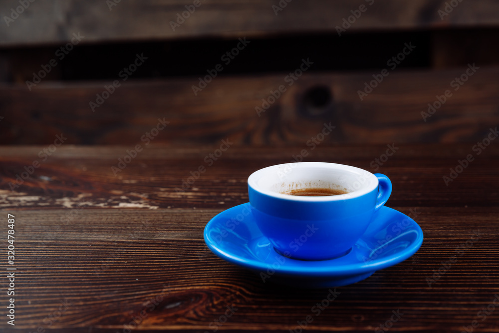 Dirty cup after coffee on a wooden table. Dirty cup after coffee on a wooden table.