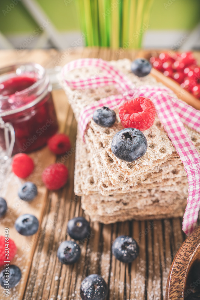 Blueberries and raspberry on pastry toast decorated at christmas image Blueberries and raspberry on pastry toast decorated at christmas image