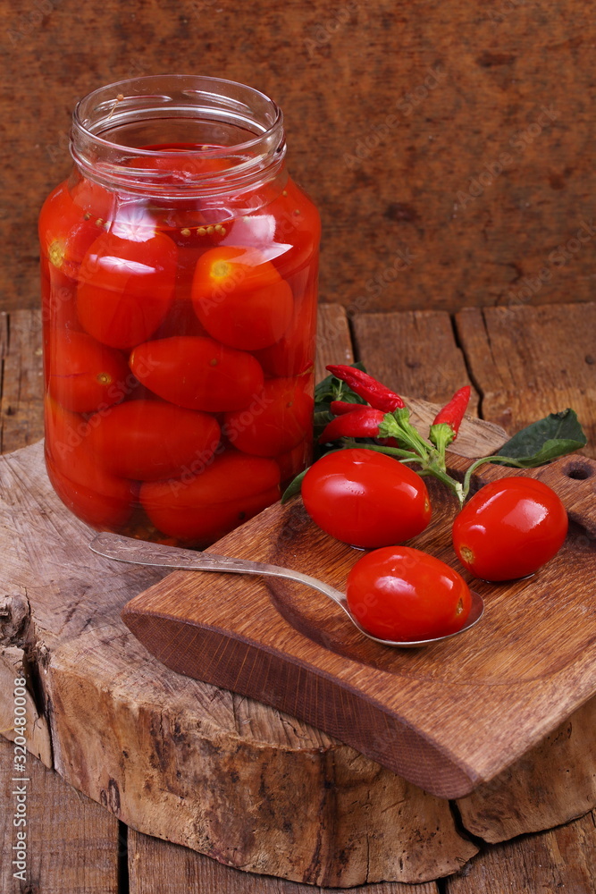 Still life with pickled tomatoes on the table Still life with pickled tomatoes on the table