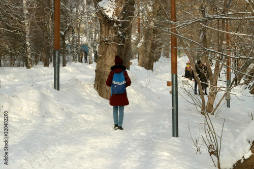woman walking in snow © Nikolaj