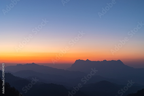 mountain layers line at morning colorful sky background, landscape