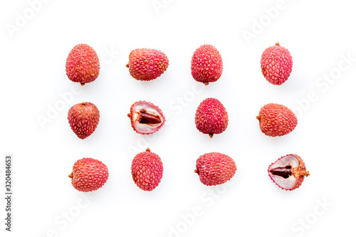 Lychee fruits pattern on white background flat lay top-down