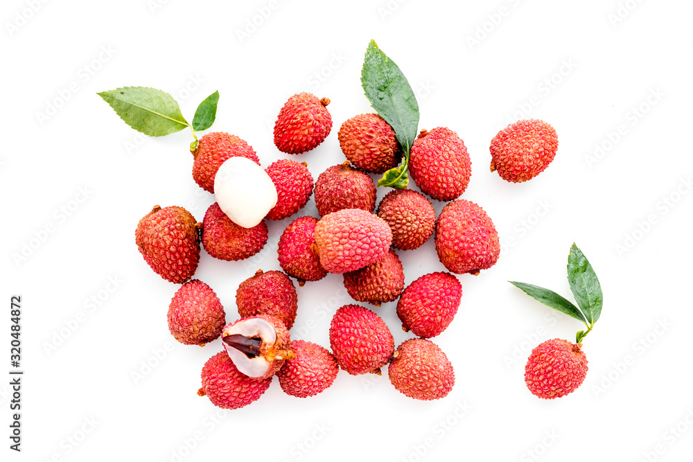 Lychee. Exotic asian fruits on white background top-down Lychee. Exotic asian fruits on white background top-down