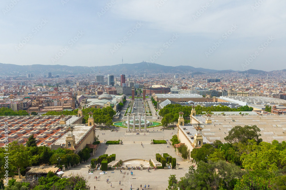 View from the inside of the National Art Museum of Catalonia (Museu Nacional d'Art de Catalunya). Beautiful cityscape with mountains in the background. Barcelona, Catalonia, Spain.