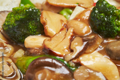 Mushroom and broccoli ankake on rice 