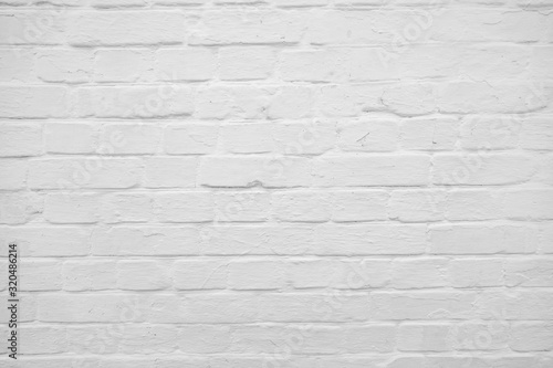 white coloured brick wall. Abstract background with empty space for your design.