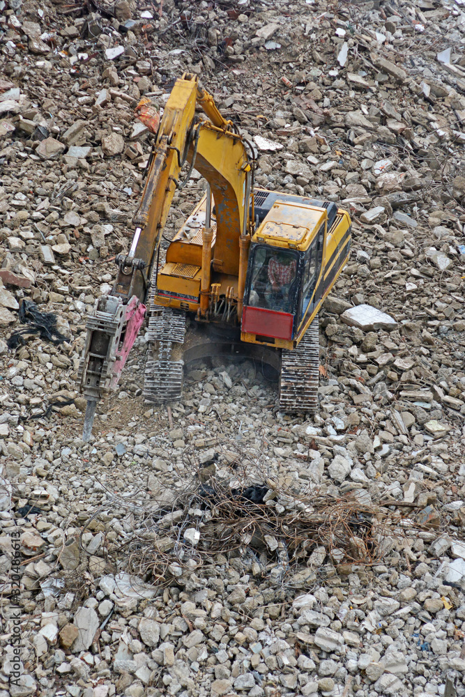 Backhoe Excavator working on construction site Backhoe Excavator working on construction site