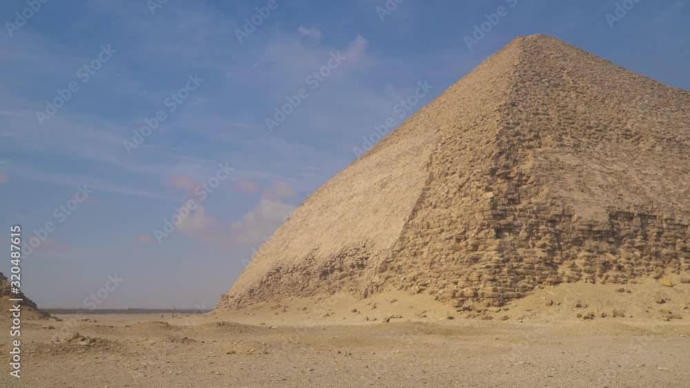 The Bent Pyramid is an ancient Egyptian pyramid located at the royal necropolis of Dahshur, approximately 40 kilometres south of Cairo, built under the Old Kingdom Pharaoh Sneferu. Egypt The Bent Pyramid is an ancient Egyptian pyramid located at the royal necropolis of Dahshur, approximately 40 kilometres south of Cairo, built under the Old Kingdom Pharaoh Sneferu. Egypt