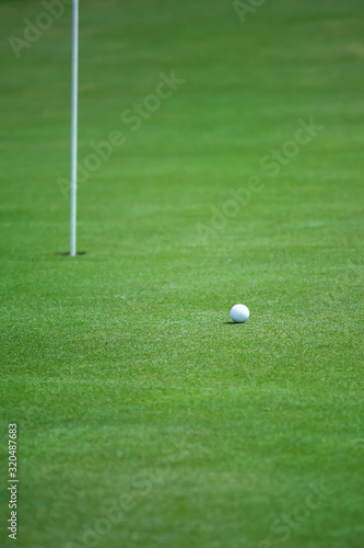 golf ball on green grass