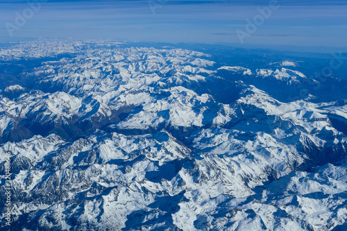 Aerial view of the entire Pyrenees mountains range on a beautiful winter afternoon 