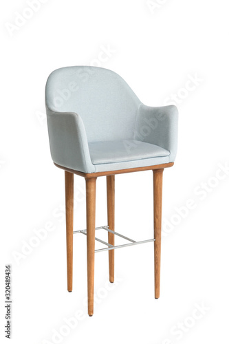Fototapeta Naklejka Na Ścianę i Meble -  Soft comfortable modern armchair on high wooden legs. Isolated on white background.
