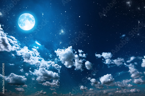 backgrounds night sky with stars and moon and clouds.