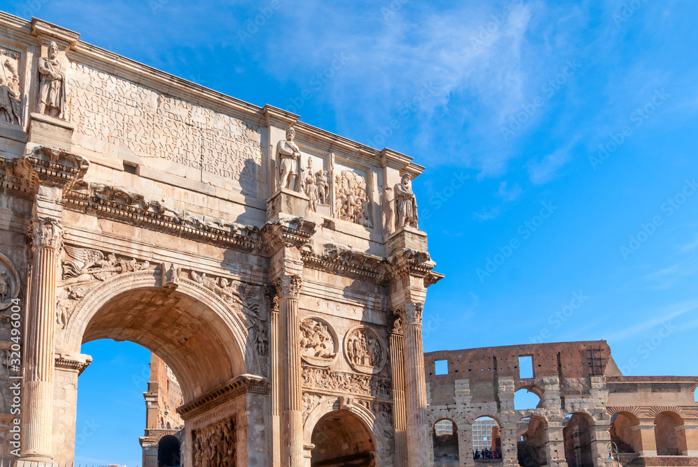 Arch of Constantine and Colosseum in Rome, Italy. Triumphal arch in Rome, Italy. North side, from the Colosseum.